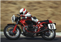 Me on one of my last race bikes - I wanted smaller grids and a more mellow scene, so I went vintage.  This one was a vintage ahrma sportsman 750 - BMW r/75. Wish I still had it.